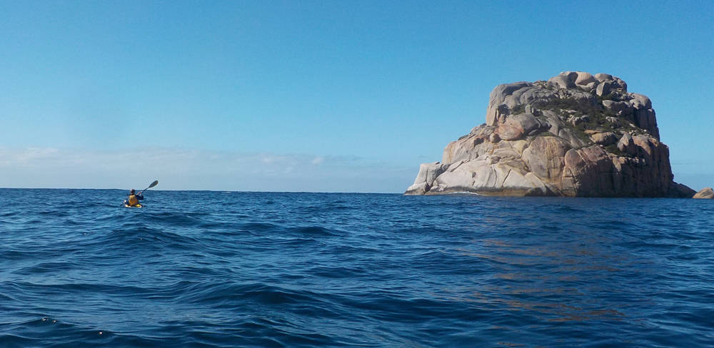 Paddling past Lemon Rock on the Freycinet Peninsula